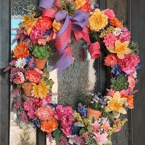 Vibrant Pink and Yellow Holiday Wreath with Floral Charm